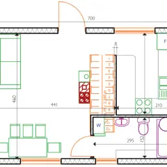 Projekt funkcjonalnego domu 35m2: salon z aneksem kuchennym, łazienka i sypialnia.