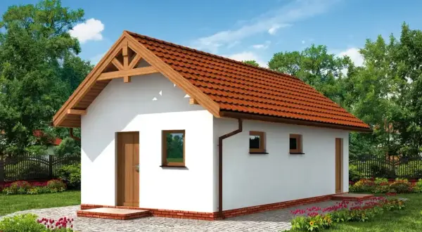 Biały budynek gospodarczy z czerwonym dachem, otoczony zielenią i kwitnącymi kwiatami.